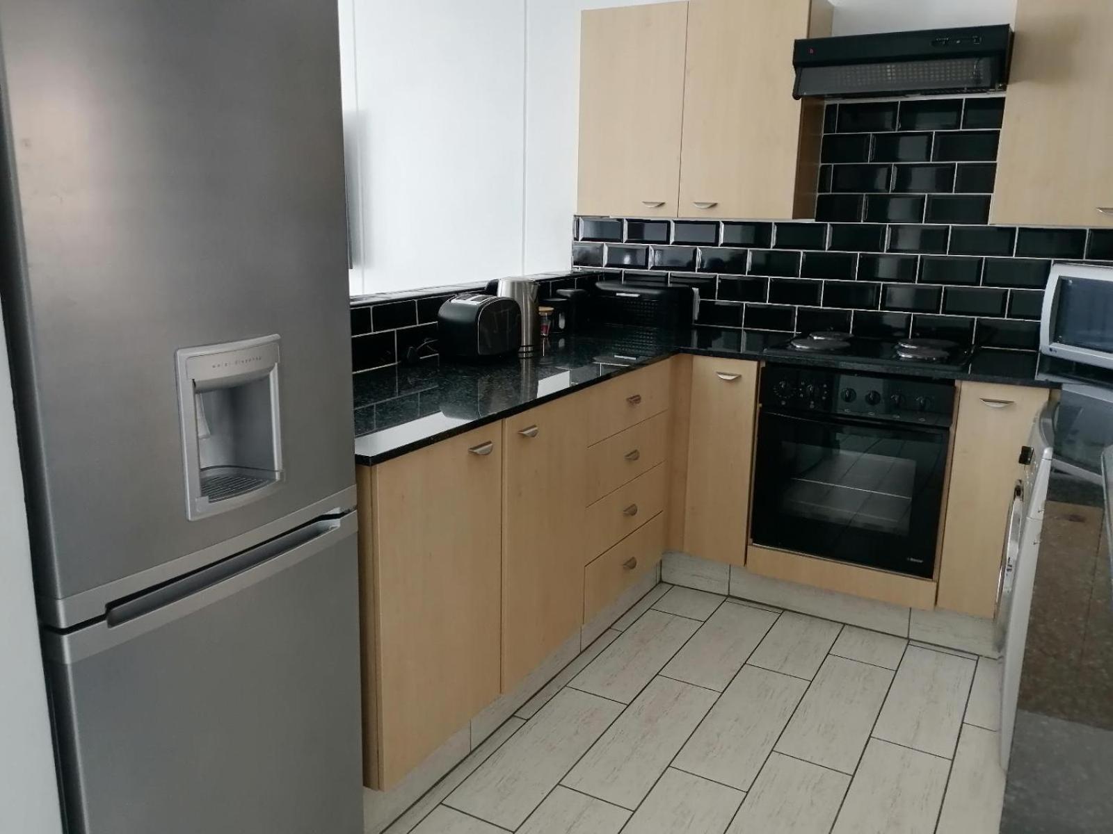 Emabheleni Executive Suites Westpoint Йоханнесбург Номер фото